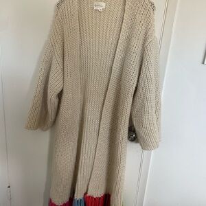 Cozy Cream Knit Sweater with Colorful Hem
